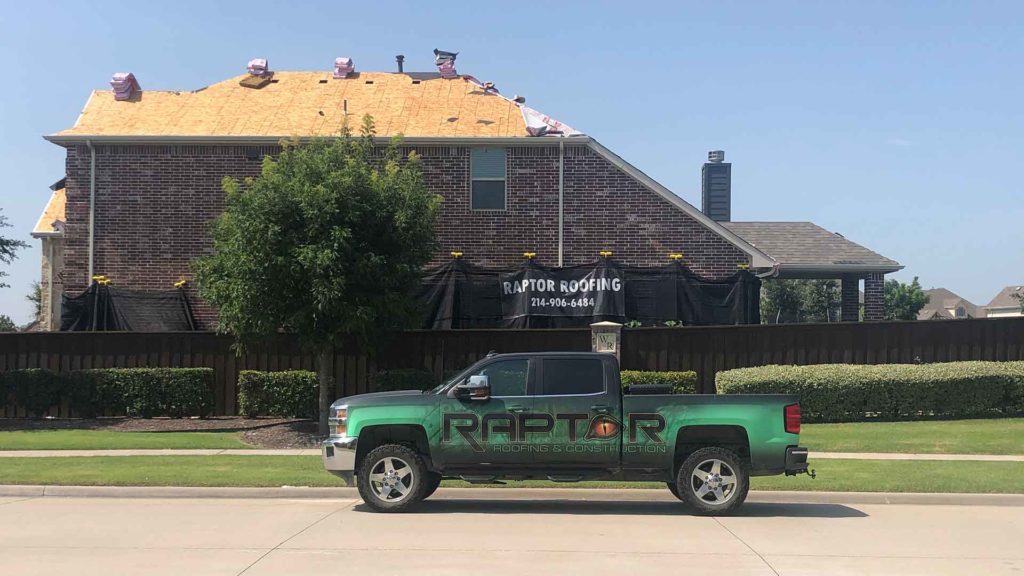 Raptor Roof truck in front of customers home- Roofing Company in Frisco, Texas neighborhood